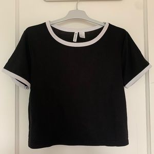 White outline black shirt